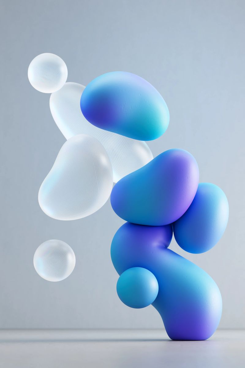 Digitally generated image of abstract 3D composition of blue, purple and glass shapes floating in the air against a grey background. Innovation, business and cloud technology concept.