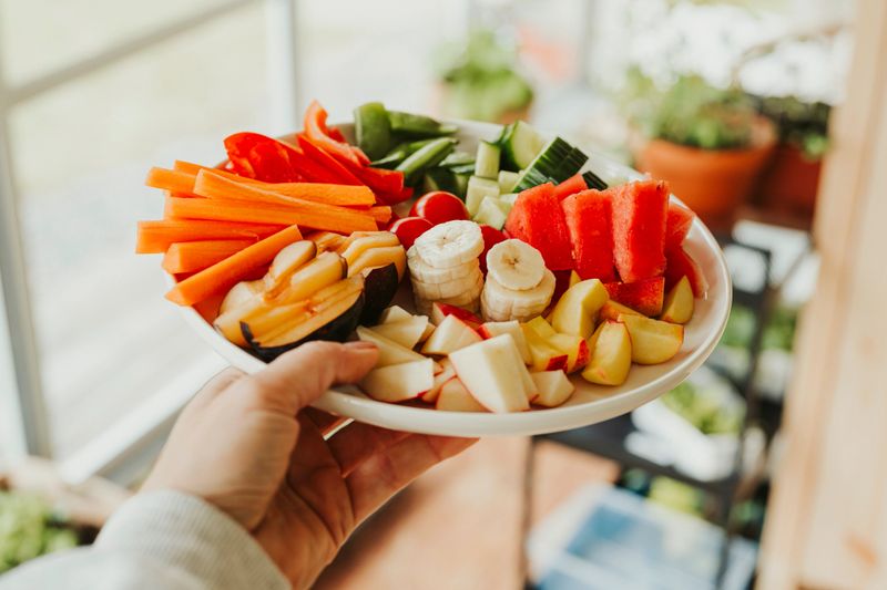 Raw vegetables and fruit thats good for gut heatlh microbiome
Plate of many various greens and fruits