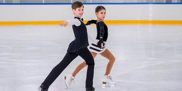A two child perform Richmond Ice Zone