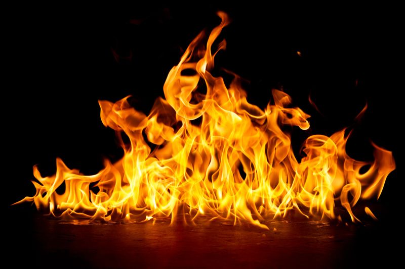 fire png burning flame Isolated on a black background