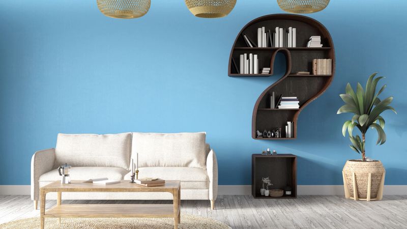 A Question Mark Shaped Wooden Bookshelf in Blue Living Room. 3D Render