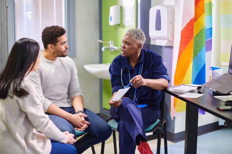 doctor explaining procedure to patient's parents