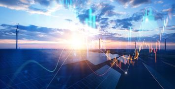 Business card, coffee cup, cookies, and paper clips arranged on a white surface.