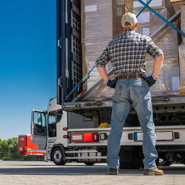 Man checking Container box with truck