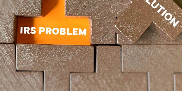 Puzzle piece labeled 'RESOLUTION' fitting into 'IRS PROBLEM' space.