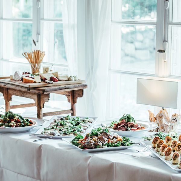 Elegant buffet setup with a variety of fresh appetizers and salads.