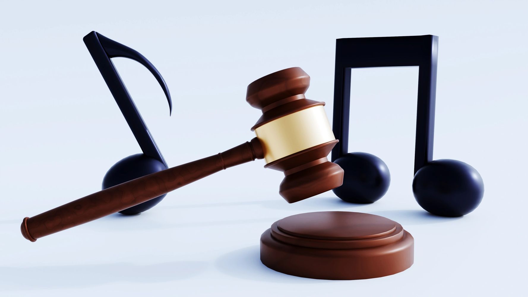 A judge's gavel with musical notes symbolizing music law.
