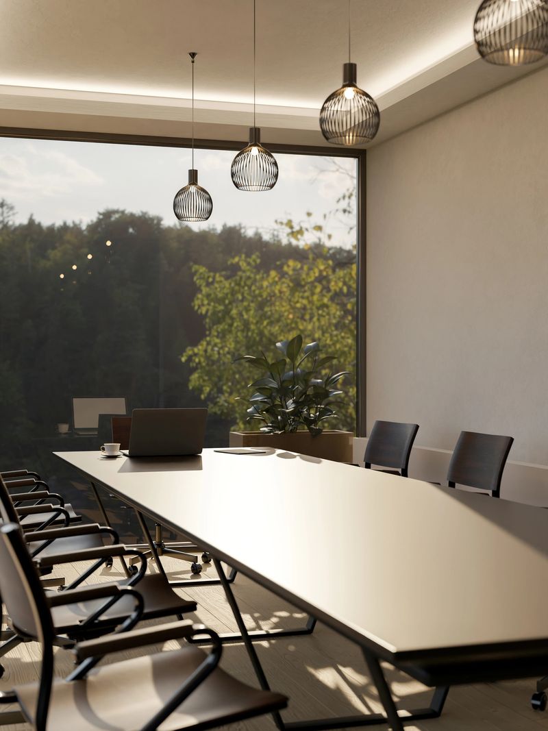 A modern, elegance meeting room with a large meeting table, a large glass window with a nature view, and modern pendant lights. place of work, boardroom, conference room, 3d render, 3d illustration