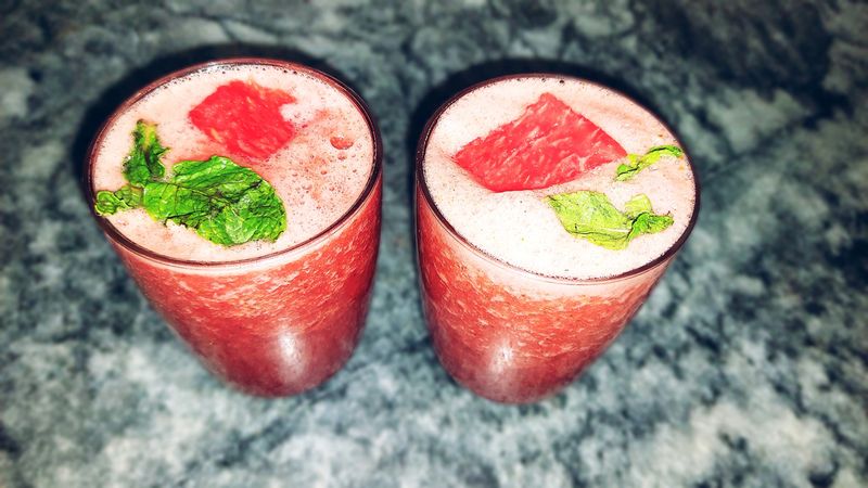 watermelon fresh juice with mint closeup view