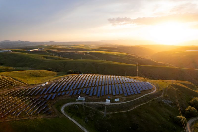 Aerial view of solar panel at sunset set