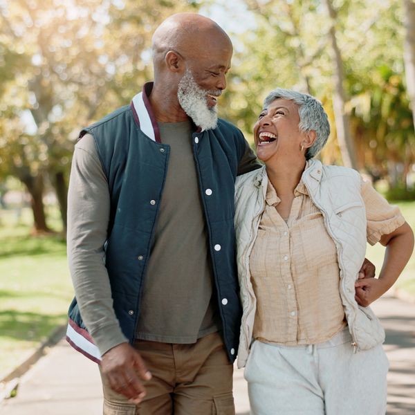 An elderly man and woman looking at each other