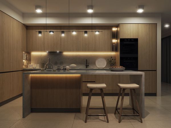 Modern kitchen with warm wooden cabinetry and ambient lighting.