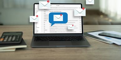Email campaign notifications on laptop screen representing digital outreach and engagement.