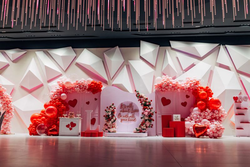 Arch on background balloons, party decoration. Photo wall decoration space or place with red and pink  balloons. Celebration baptism concept. Birthday party. Wedding reception