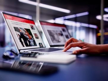 Digital devices and social media icons representing media engagement in 2025.
