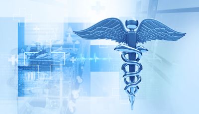 Blue medical caduceus symbol with healthcare background.