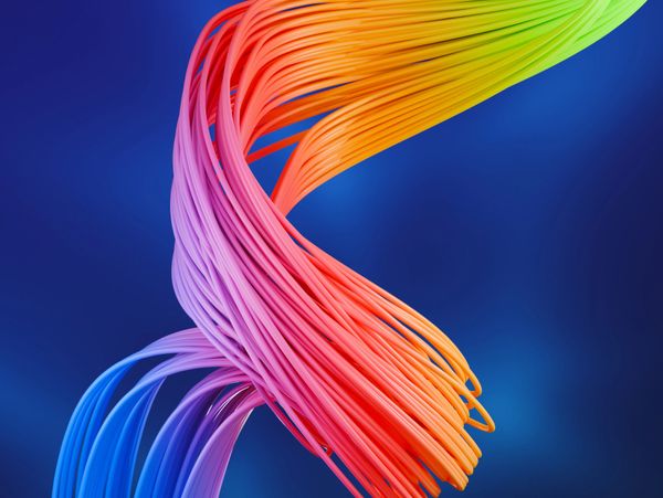 Colorful, flowing strands twisting against a deep blue background. Artificial intelligence AI