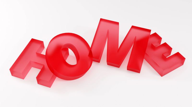 Luxury glass red inscription home on grey podium, soft light, front view smooth background, 3d rendering