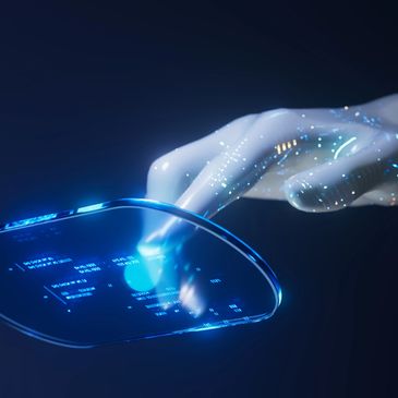 Futuristic hand interacting with a glowing transparent digital interface.