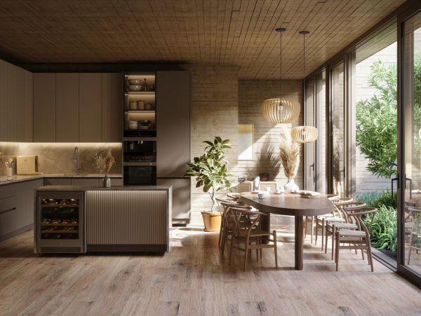 Modern kitchen and dining area with natural light and wooden elements.