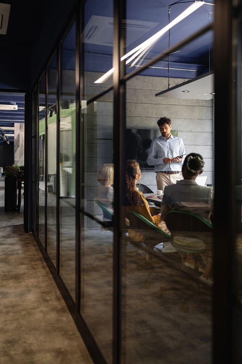 A multiracial group of young and senior  business people having a meeting at the meeting room, brainstorming new business ideas