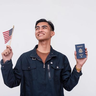 A United States passport on an American flag.
