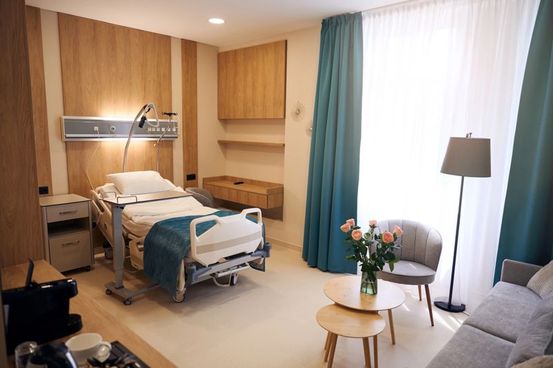 Beautiful interior of empty comfortable medical room with modern furniture in maternity clinic at daytime
