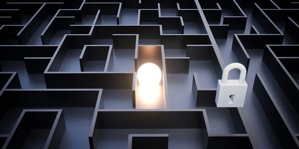 Maze, lock and illuminated ball.  Needing cyber strategy to navigate issues, manage risks. etc.