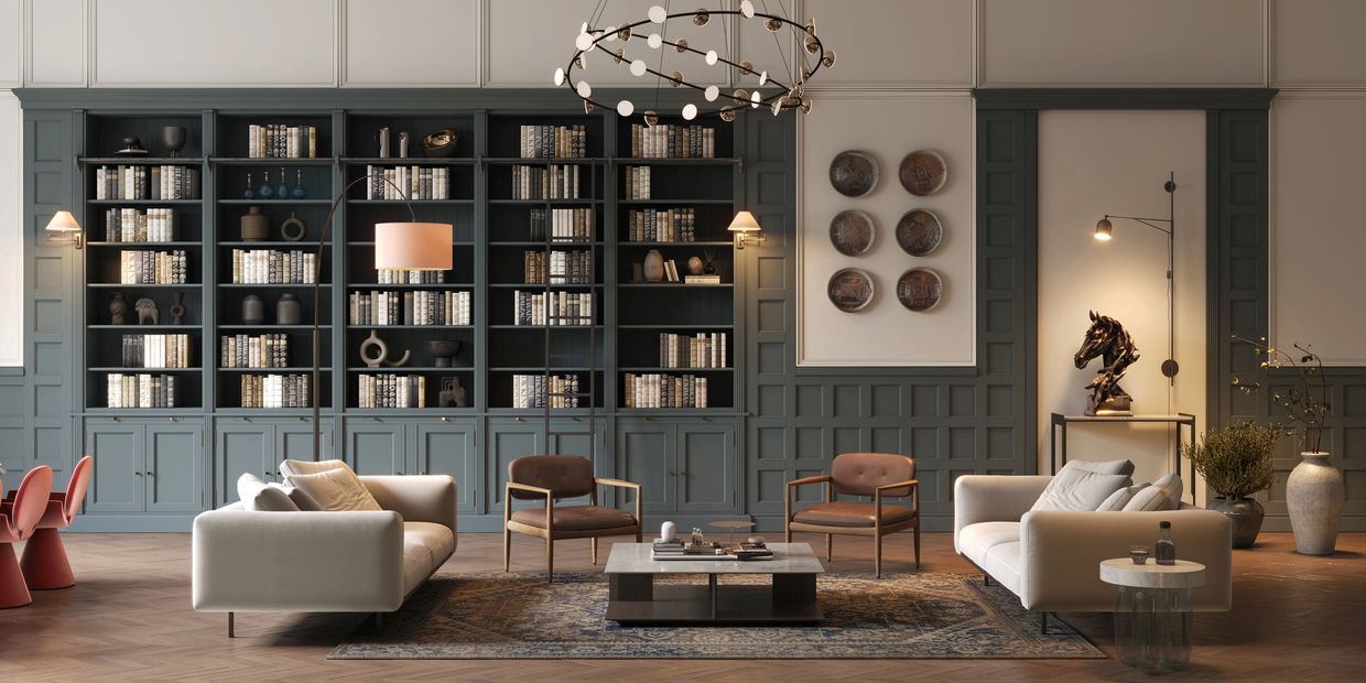 Elegant living room with neutral sofas, leather chairs, and a large bookcase.