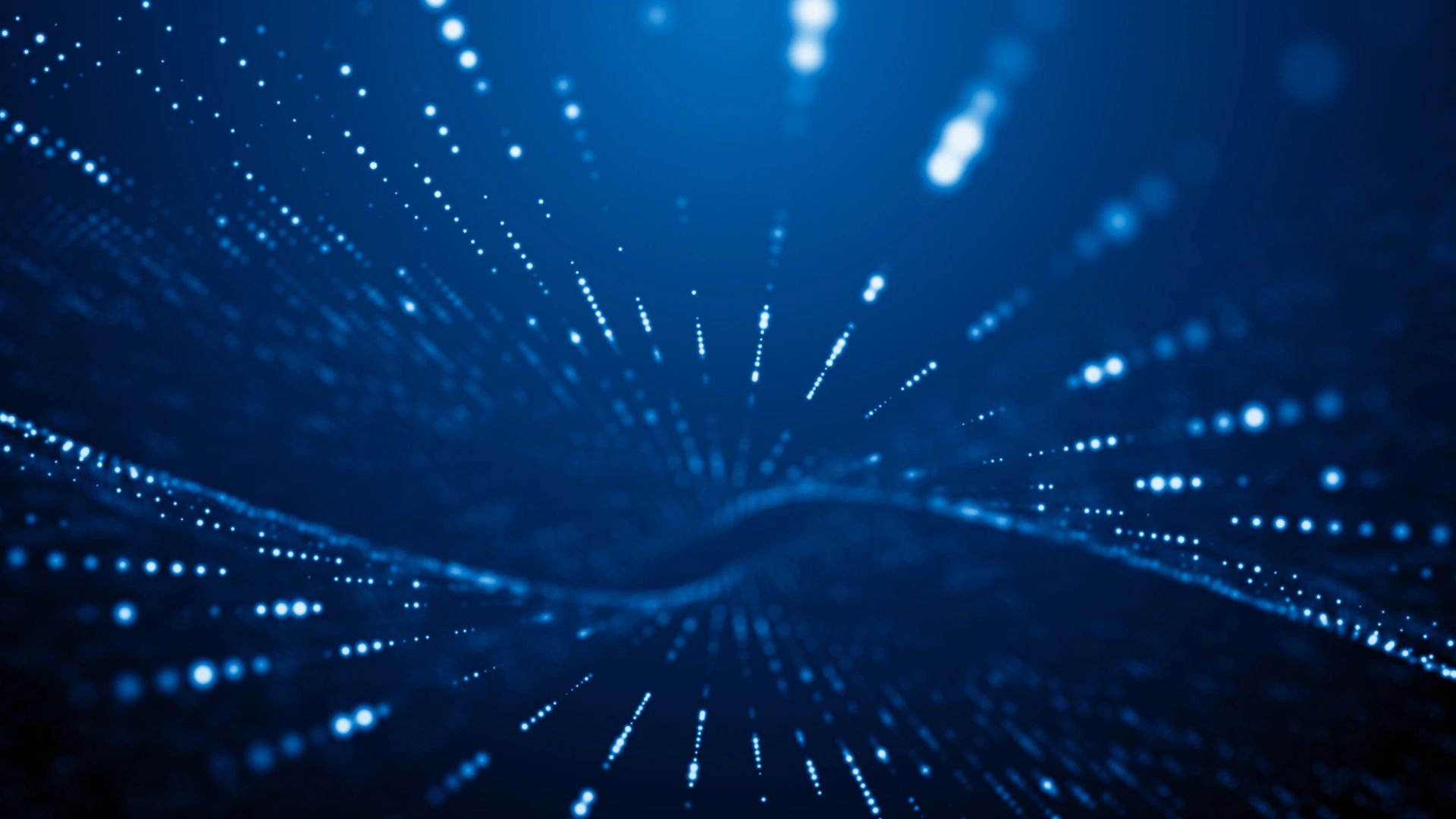 Abstract blue digital dots forming a wave-like pattern.