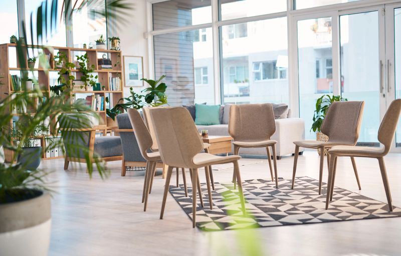 Modern Support Group Meeting Room With Comfortable Seating and Natural Light