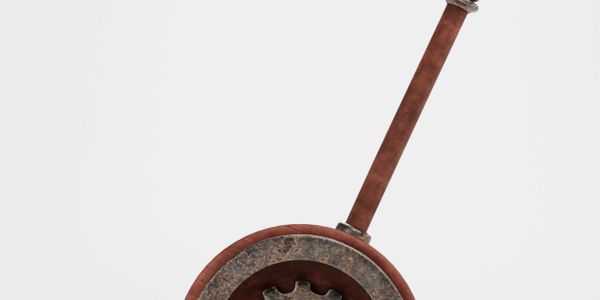 Rustic lever mechanism with a gear and wooden handle.