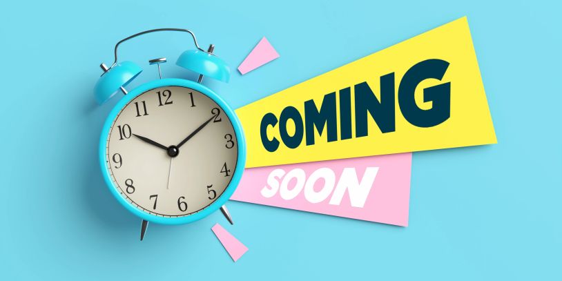 Blue alarm clock with "Coming Soon" text