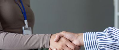 Partner With Us Hands shake 