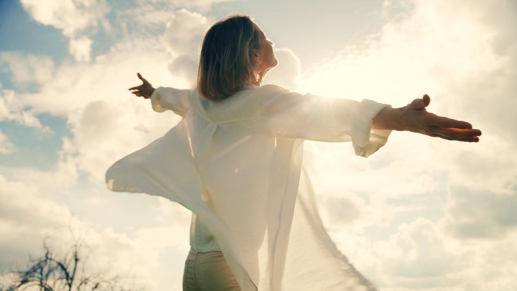 Woman finding freedom through smoatic body work and yoga in Denton, TX