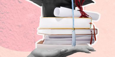 A bunch of books on a hand