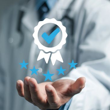 Doctor presenting a quality certification symbol with stars.