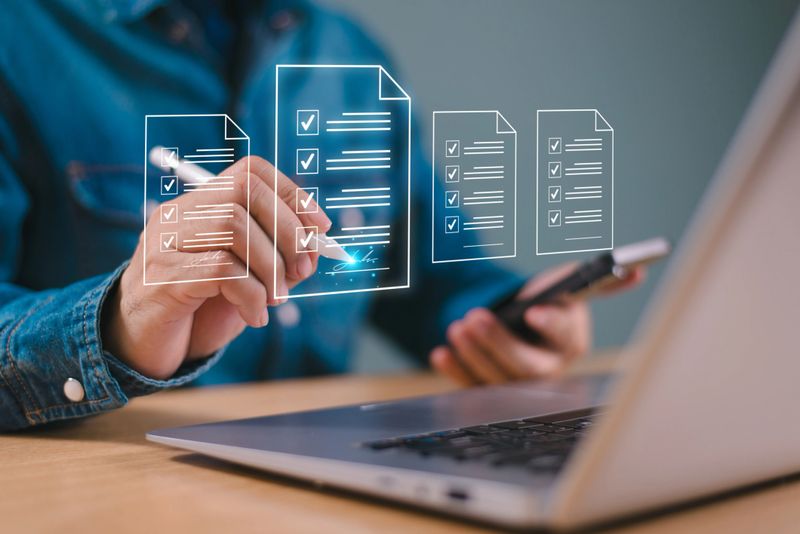 E-document contract management concept. Online digital signature business, paperless workplace, e-signing network, electronic document management. Businessman sign on computer virtual screen by pen