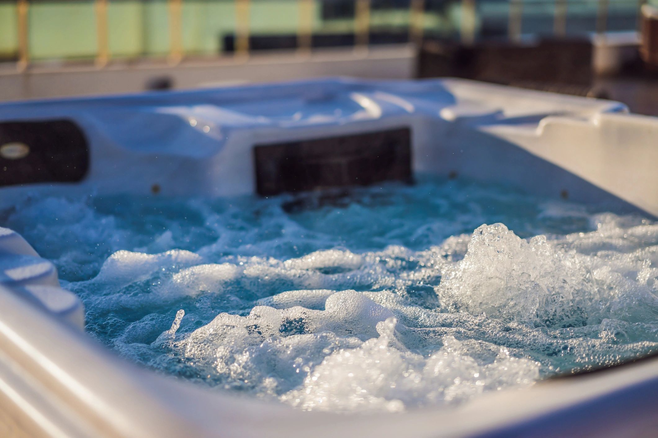 Close-up of bubbling water in a hot tub or jacuzzi.