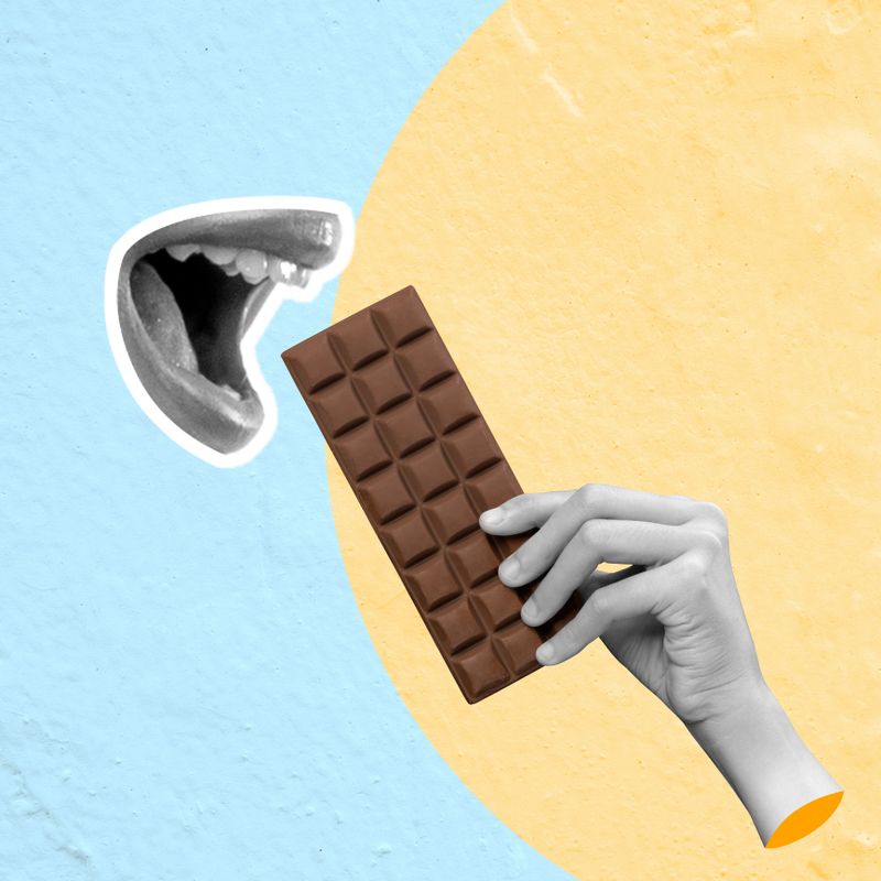 A human hand eats a chocolate bar on a colored background. Collage art