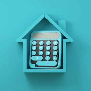Calculator inside a house-shaped frame, symbolizing home finance or mortgage calculations.