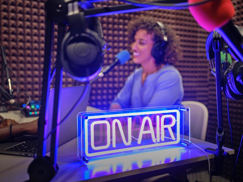 Recording a podcast in a professional studio.