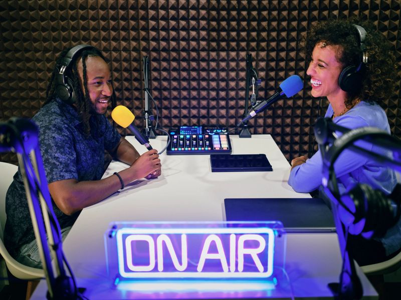 Recording a podcast in a professional studio.