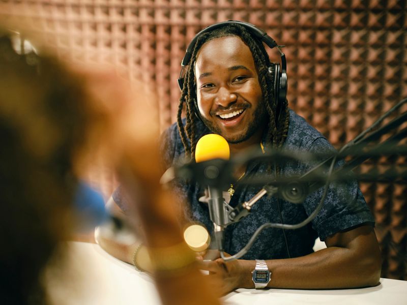 Recording a podcast in a professional studio.