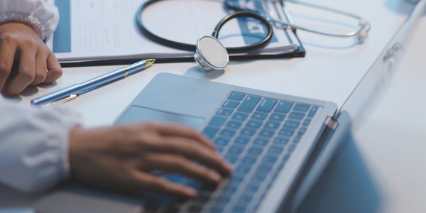 doctor using laptop
