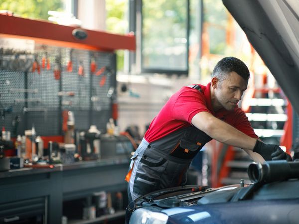 Auto repair technician at work.