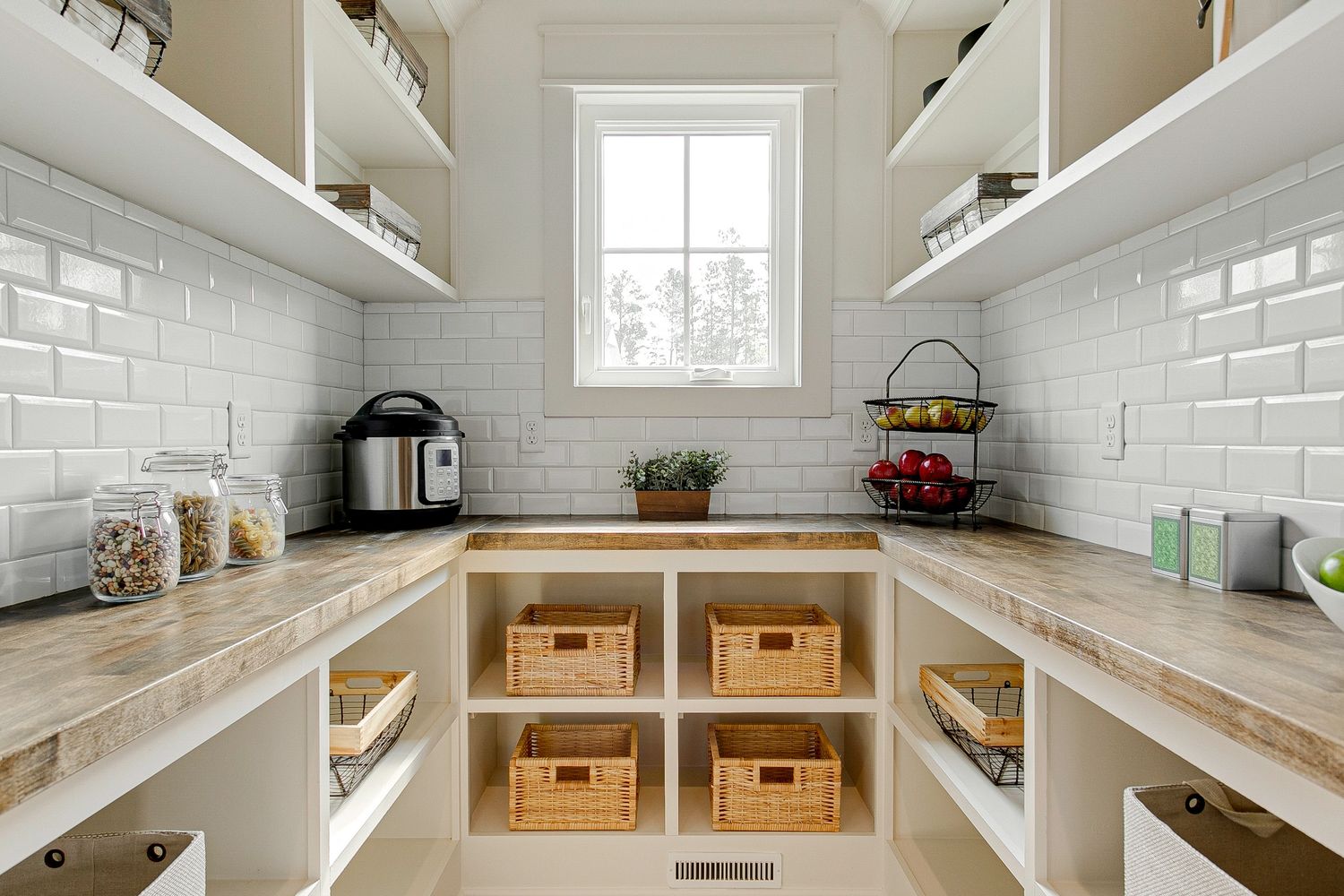 Organized home pantry with open shelving