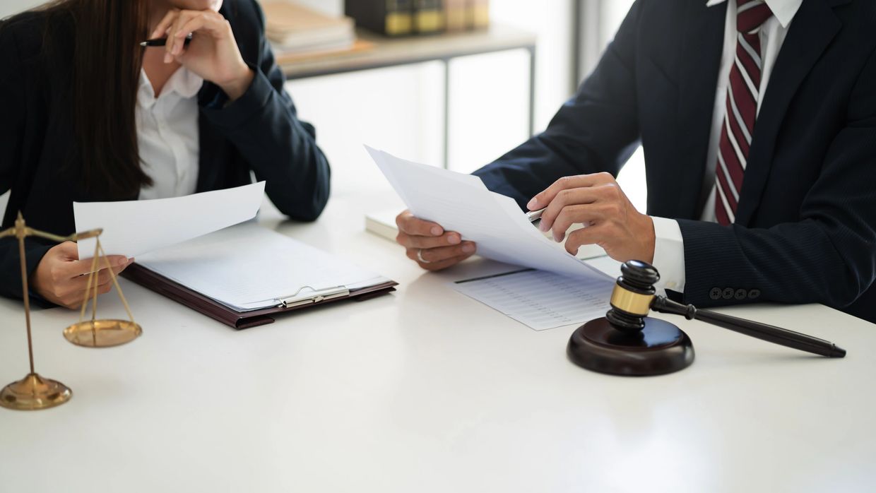 Two lawyers discussing