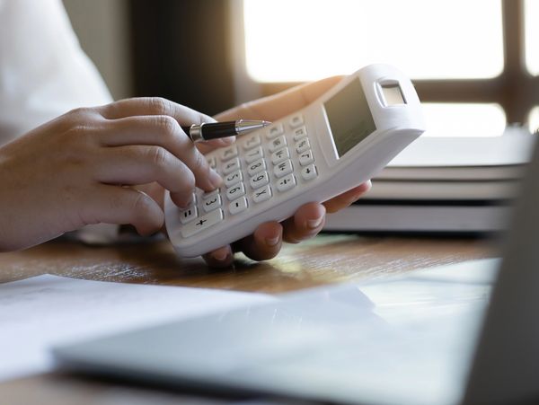 A man calculate tax and accounting