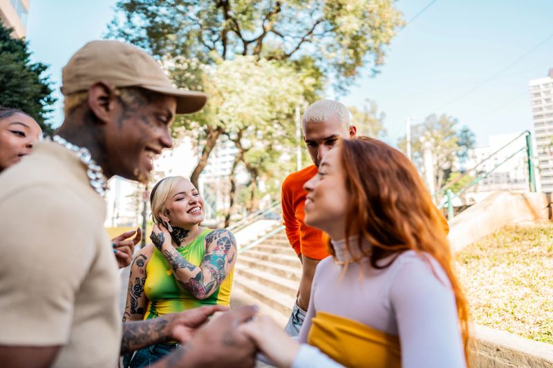 LGBTQIA+ friends talking outdoors